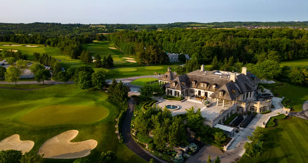 Aerial view of the Magna Golf Club clubhouse and course